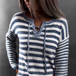 Dark blue v-necked sweater